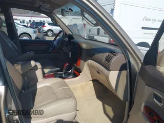 2000 Lexus LX 470 with VIN JT6HT00W8Y0118377, listed as a IAAI auction lot 41787649 with 230,442 mi miles and . Bid and sale history available at carsss.com. Image 5.
