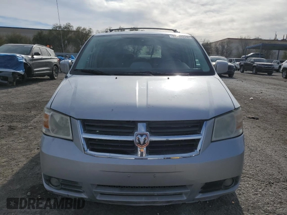 2009 Dodge Grand Caravan SXT z VIN 2D8HN54159R620187, wystawiony jako Copart lot #84703224 z przebiegiem 206 240 mil mil oraz Szkoda całkowita • Salvage title. Historia ofert i sprzedaży dostępna na DreamBid. Obrazek 5.