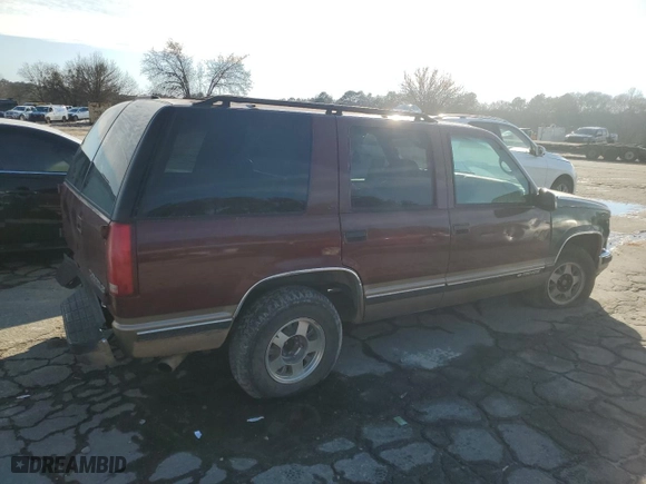 1999 Chevrolet Tahoe with VIN 1GNEC13RXXJ385740, listed as a Copart auction lot 86870484 with 271,302 mi miles and Salvage Title. Bid and sale history available at carsss.com. Image 3.