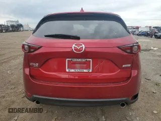 2019 Mazda CX-5 Grand Touring z VIN JM3KFBDM2K0665993, wystawiony jako Copart lot #58440685 z przebiegiem 38 306 mil mil oraz Szkoda całkowita • Salvage title. Historia ofert i sprzedaży dostępna na DreamBid. Obrazek 6.