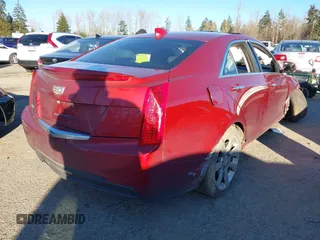 2015 Cadillac ATS Sedan Luxury RWD with VIN 1G6AB5RA9F0121967, listed as a IAAI auction lot 41557208 with 65,122 mi miles. Bid and sale history available at carsss.com. Image 4.