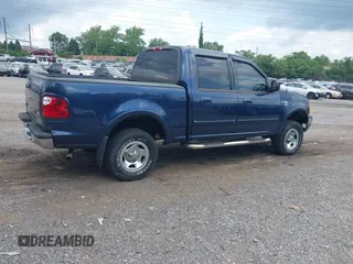 2003 Ford F-150 XLT with VIN 1FTRW08L73KB50541, listed as a IAAI auction lot 42740941 with 181,828 mi miles and . Bid and sale history available at DreamBid. Image 4.