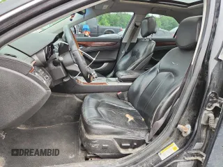 2010 Cadillac CTS Luxury with VIN 1G6DG5EG6A0129381, listed as a Copart auction lot 59180655 with 211,048 mi miles and Salvage title. Bid and sale history available at DreamBid. Image 7.