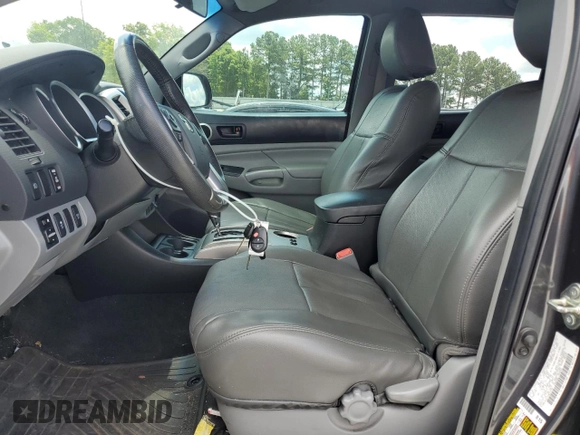 2015 Toyota Tacoma with VIN 3TMMU4FN1FM073755, listed as a Copart auction lot 59657105 with 114,193 mi miles and Salvage title. Bid and sale history available at DreamBid. Image 7.