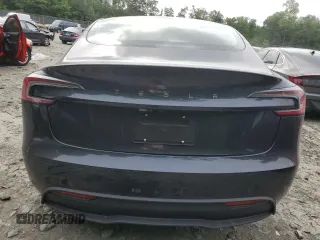 2025 Tesla Model 3 Long Range with VIN 5YJ3E1EAXSF878982, listed as a Copart auction lot 60302315 with 4,312 mi miles and Salvage title. Bid and sale history available at DreamBid. Image 6.