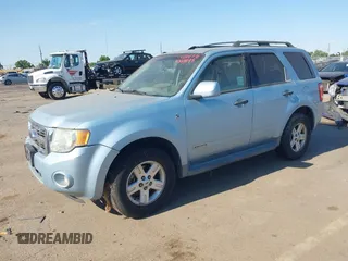 2008 Ford Escape Hybrid with VIN 1FMCU59H98KC31885, listed as a IAAI auction lot 42631198 with 369,266 mi miles and . Bid and sale history available at DreamBid. Image 2.