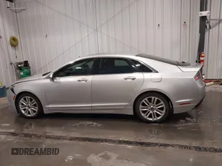 2016 Lincoln MKZ with VIN 3LN6L2G91GR606897, listed as a IAAI auction lot 41946522 with 143,347 mi miles and . Bid and sale history available at DreamBid. Image 14.
