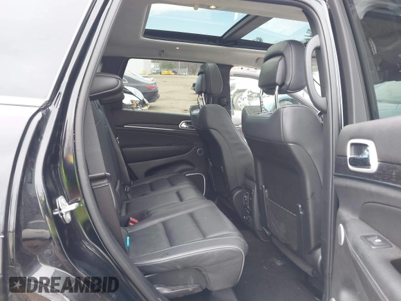 2020 Jeep Grand Cherokee Summit with VIN 1C4RJFJT5LC355247, listed as a IAAI auction lot 41809100 with 62,910 mi miles and . Bid and sale history available at DreamBid. Image 8.