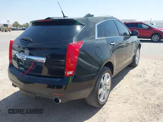 2011 Cadillac SRX Performance Collection z VIN 3GYFNBEYXBS543464, wystawiony jako IAAI lot #42350098 z przebiegiem 146 747 mil mil oraz . Historia ofert i sprzedaży dostępna na DreamBid. Obrazek 4.