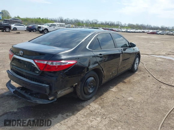 2016 Toyota Camry XLE with VIN 4T4BF1FK0GR581297, listed as a IAAI auction lot 42059507 with 151,777 mi miles. Bid and sale history available at carsss.com. Image 4.