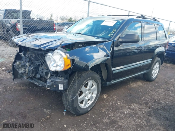 2009 Jeep Grand Cherokee Laredo with VIN 1J8GR48K99C550822, listed as a IAAI auction lot 41868508 with 179,436 mi miles. Bid and sale history available at carsss.com. Image 18.