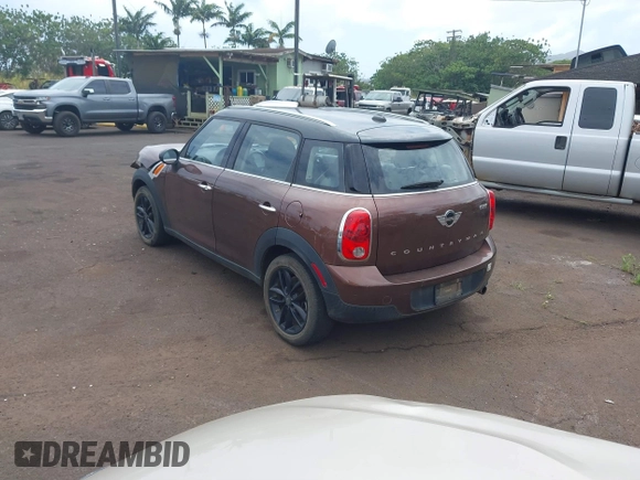 2014 MINI Countryman with VIN WMWZB3C51EWR36737, listed as a IAAI auction lot 41741248 with 69,717 mi miles and . Bid and sale history available at DreamBid. Image 3.