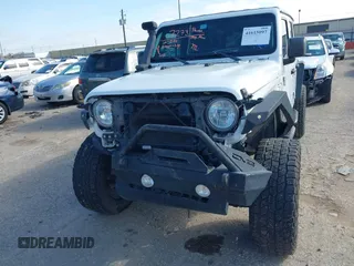 2018 Jeep Wrangler Unlimited Sport S с VIN 1C4HJXDG0JW205803, выставлен на аукционе IAAI как лот 41615097 с пробегом Не указан миль и . История ставок и продаж доступна на DreamBid. Изображение 6.