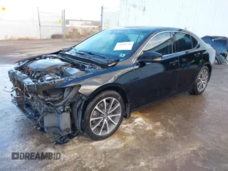 2015 Acura TLX Advance z VIN 19UUB3F72FA010258, wystawiony jako IAAI lot #41208796 z przebiegiem 158 125 mil mil oraz . Historia ofert i sprzedaży dostępna na DreamBid. Obrazek 19.