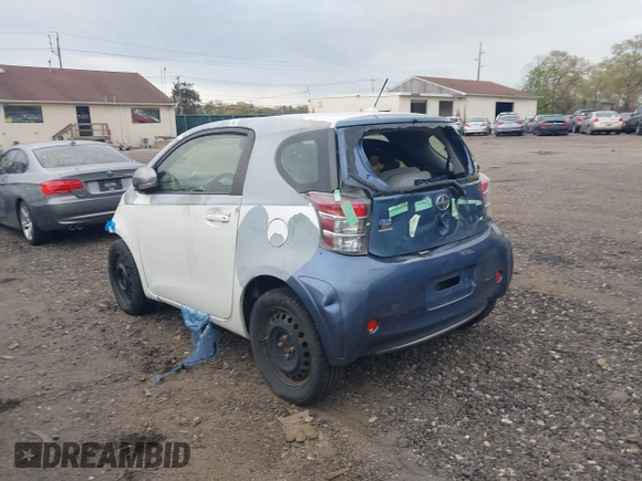 2013 Scion iQ with VIN JTNJJXB06DJ022801, listed as a IAAI auction lot 42152740 with Not provided miles and . Bid and sale history available at DreamBid. Image 3.