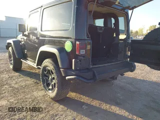 2013 Jeep Wrangler Sahara with VIN 1C4AJWBG8DL565227, listed as a IAAI auction lot 41987087 with 90,644 mi miles and . Bid and sale history available at DreamBid. Image 3.