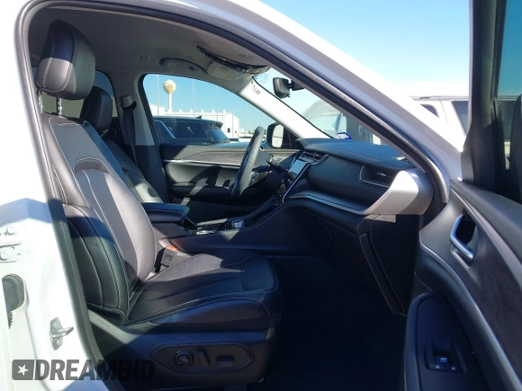 2023 Jeep Grand Cherokee Limited with VIN 1C4RJGBG2PC521012, listed as a IAAI auction lot 41145914 with 51,686 mi miles and . Bid and sale history available at DreamBid. Image 5.