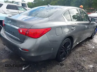 2014 Infiniti Q50 Premium with VIN JN1BV7AP8EM693109, listed as a IAAI auction lot 42183699 with 171,981 mi miles and . Bid and sale history available at DreamBid. Image 4.
