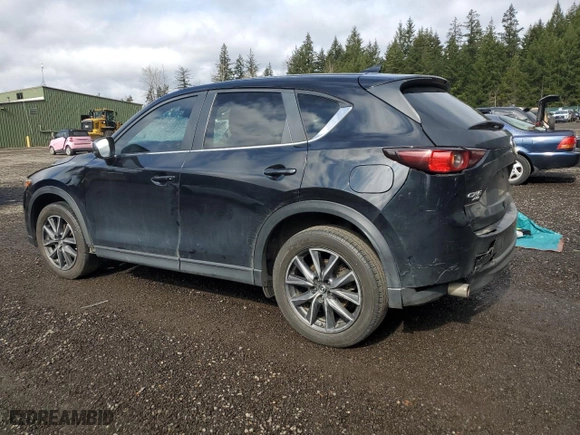 2018 Mazda CX-5 Touring with VIN JM3KFBCM0J0370942, listed as a Copart auction lot 47953165 with 130,867 mi miles and Salvage Title. Bid and sale history available at carsss.com. Image 2.