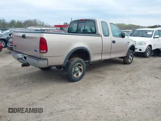 1997 Ford F-150 XL with VIN 1FTDX18W9VNC18055, listed as a IAAI auction lot 41982829 with 189,513 mi miles. Bid and sale history available at carsss.com. Image 4.