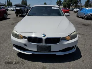 2013 BMW 3 Series 328i z VIN WBA3C1C56DF436269, wystawiony jako Copart lot #57311725 z przebiegiem 139 482 mil mil oraz Szkody całkowita. Historia ofert i sprzedaży dostępna na DreamBid. Obrazek 5.