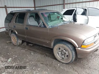 2004 Chevrolet Blazer LS z VIN 1GNDT13X54K159900, wystawiony jako IAAI lot #42374099 z przebiegiem 111 023 mil mil oraz . Historia ofert i sprzedaży dostępna na DreamBid. Obrazek 1.