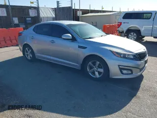 2015 Kia Optima LX with VIN 5XXGM4A78FG464814, listed as a IAAI auction lot 41981801 with 104,673 mi miles. Bid and sale history available at carsss.com. Image 1.