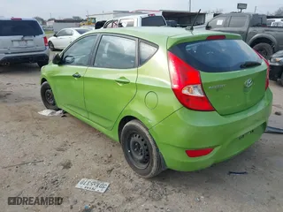 2014 Hyundai Accent GS with VIN KMHCT5AE8EU164507, listed as a IAAI auction lot 41540324 with 216,144 mi miles. Bid and sale history available at carsss.com. Image 3.