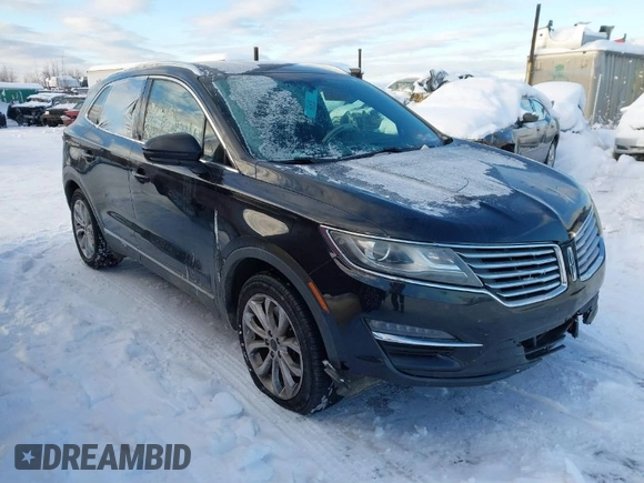 2015 Lincoln MKC with VIN 5LMTJ2AHXFUJ01440, listed as a IAAI auction lot 41526975 with 104,280 mi miles. Bid and sale history available at carsss.com. Image 1.