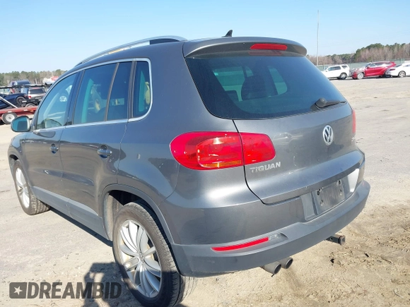 2012 Volkswagen Tiguan SE with VIN WVGAV7AX5CW000275, listed as a IAAI auction lot 41789246 with 123,618 mi miles and . Bid and sale history available at DreamBid. Image 3.