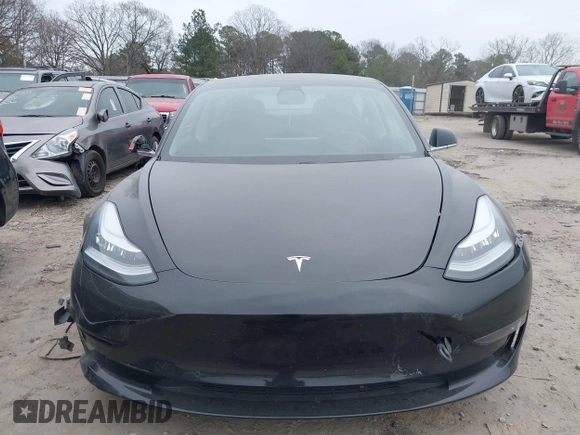 2019 Tesla Model 3 Mid Range with VIN 5YJ3E1EA5KF297213, listed as a IAAI auction lot 41361412 with 93,801 mi miles and . Bid and sale history available at carsss.com. Image 12.