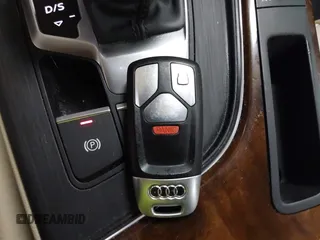 2017 Audi A4 Premium Plus z VIN WAUENAF45HN039427, wystawiony jako IAAI lot #41595241 z przebiegiem 64 605 mil mil oraz . Historia ofert i sprzedaży dostępna na DreamBid. Obrazek 11.