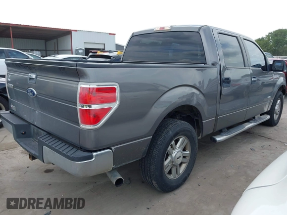 2013 Ford F-150 XL with VIN 1FTFW1CTXDFA78857, listed as a IAAI auction lot 42416880 with 215,031 mi miles and . Bid and sale history available at DreamBid. Image 4.