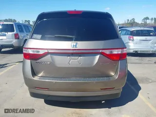 2013 Honda Odyssey Touring with VIN 5FNRL5H96DB066008, listed as a IAAI auction lot 41734055 with 120,292 mi miles. Bid and sale history available at carsss.com. Image 16.