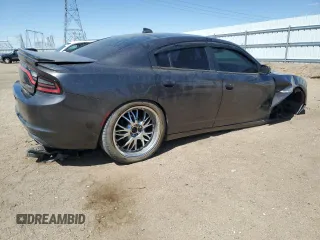 2015 Dodge Charger SXT z VIN 2C3CDXHG3FH800988, wystawiony jako Copart lot #54221905 z przebiegiem 134 098 mil mil oraz Szkoda całkowita • Salvage title. Historia ofert i sprzedaży dostępna na DreamBid. Obrazek 3.