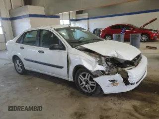 2003 Ford Focus LX with VIN 1FAFP33P43W201570, listed as a Copart auction lot 43130555 with 222,727 mi miles and Salvage Title. Bid and sale history available at carsss.com. Image 4.