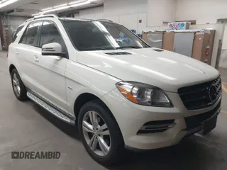 2012 Mercedes-Benz M with VIN 4JGDA5HB1CA037084, listed as a IAAI auction lot 41938754 with 147,097 mi miles. Bid and sale history available at carsss.com. Image 1.