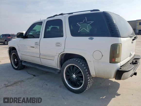 2004 Chevrolet Tahoe LS z VIN 1GNEC13Z74R212156, wystawiony jako Copart lot #54797605 z przebiegiem 201 902 mil mil oraz Szkoda całkowita • Salvage title. Historia ofert i sprzedaży dostępna na DreamBid. Obrazek 2.