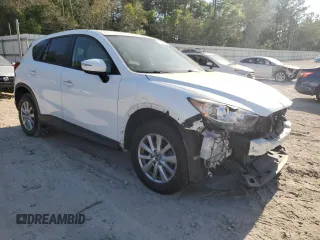 2015 Mazda CX-5 Touring with VIN JM3KE2CY1F0538116, listed as a Copart auction lot 52920205 with 176,476 mi miles and Salvage Title. Bid and sale history available at carsss.com. Image 4.