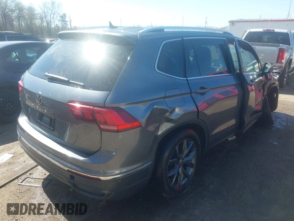 2022 Volkswagen Tiguan SE with VIN 3VV3B7AX1NM120097, listed as a IAAI auction lot 41967493 with 57,802 mi miles and . Bid and sale history available at DreamBid. Image 4.