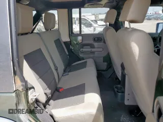 2008 Jeep Wrangler Unlimited X с VIN 1J4GA39128L537191, выставлен на аукционе Copart как лот 56844345 с пробегом 305 764 миль миль и Списание • Salvage title. История ставок и продаж доступна на DreamBid. Изображение 10.