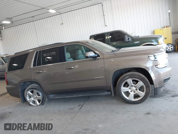 2016 Chevrolet Tahoe LT with VIN 1GNSKBKC9GR172076, listed as a IAAI auction lot 42223918 with 92,348 mi miles and . Bid and sale history available at DreamBid. Image 13.