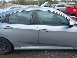 2019 Honda Civic LX with VIN 19XFC2F61KE009471, listed as a IAAI auction lot 42017532 with 81,134 mi miles and . Bid and sale history available at DreamBid. Image 13.