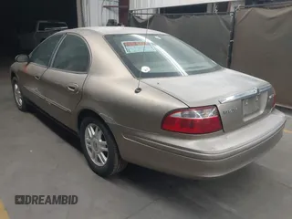 2004 Mercury Sable LS Premium z VIN 1MEFM55S54G601180, wystawiony jako IAAI lot #42162460 z przebiegiem 104 613 mil mil oraz . Historia ofert i sprzedaży dostępna na DreamBid. Obrazek 3.