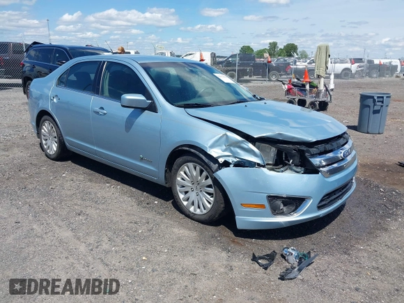 2010 Ford Fusion Hybrid z VIN 3FADP0L33AR385001, wystawiony jako IAAI lot #42074965 z przebiegiem 195 962 mil mil oraz . Historia ofert i sprzedaży dostępna na DreamBid. Obrazek 1.