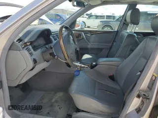 2002 Mercedes-Benz E-Class with VIN WDBJF65J02B495961, listed as a Copart auction lot 73844554 with 99,380 mi miles and Salvage Title. Bid and sale history available at carsss.com. Image 7.