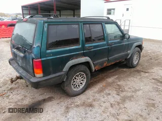 1997 Jeep Cherokee Sport with VIN 1J4FJ68S8VL500942, listed as a IAAI auction lot 40810846 with 224,782 mi miles. Bid and sale history available at carsss.com. Image 4.