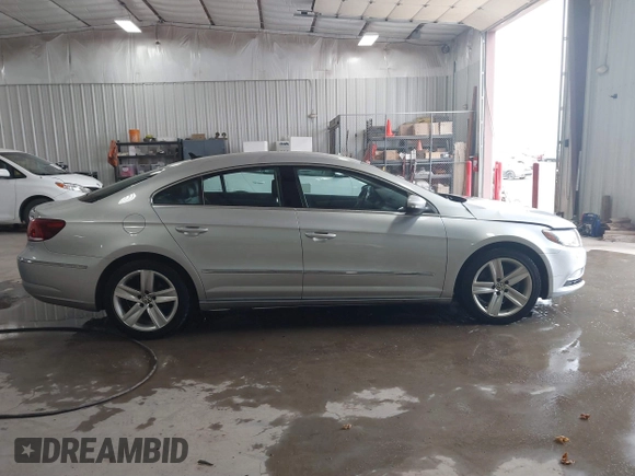 2015 Volkswagen CC R-Line z VIN WVWBP7AN9FE826400, wystawiony jako IAAI lot #40931896 z przebiegiem 117 022 mil mil oraz . Historia ofert i sprzedaży dostępna na DreamBid. Obrazek 13.