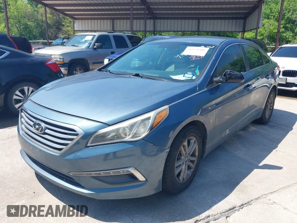 2015 Hyundai Sonata SE z VIN 5NPE24AF2FH243041, wystawiony jako IAAI lot #41978209 z przebiegiem 132 606 mil mil oraz . Historia ofert i sprzedaży dostępna na DreamBid. Obrazek 2.
