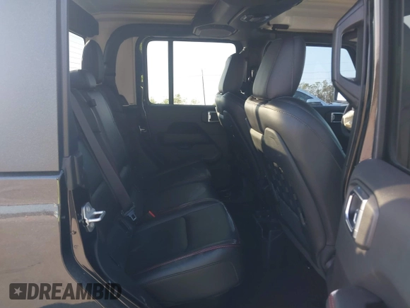 2023 Jeep Gladiator Rubicon z VIN 1C6JJTBGXPL543787, wystawiony jako IAAI lot #40963799 z przebiegiem 5 402 mil mil oraz . Historia ofert i sprzedaży dostępna na DreamBid. Obrazek 8.